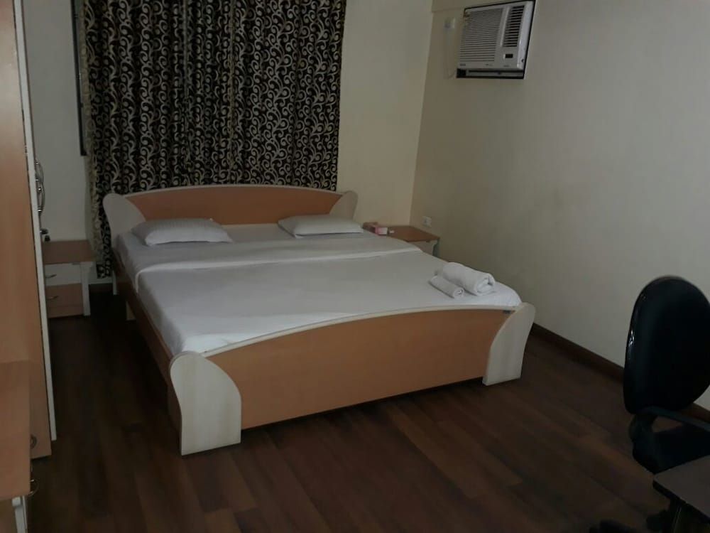 Пуна: Kalpatharuvu Service Apartments