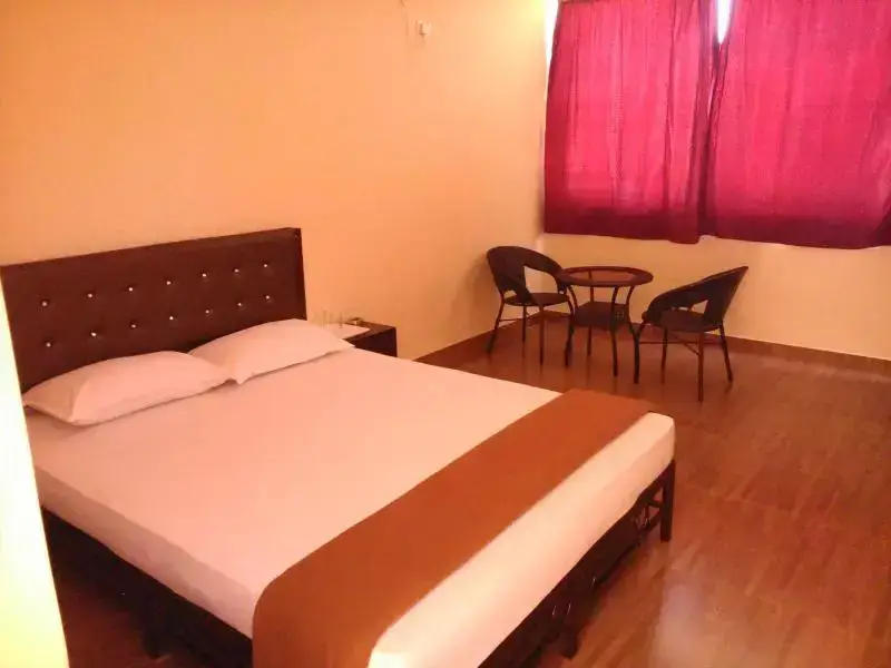 Бага: Amoura Guest House