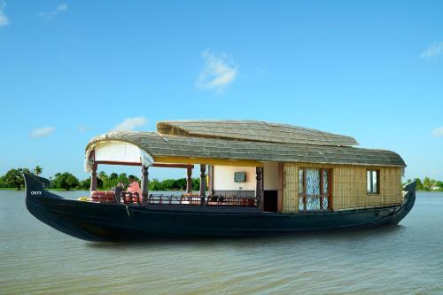 Кумараком: Shivaganga Houseboat