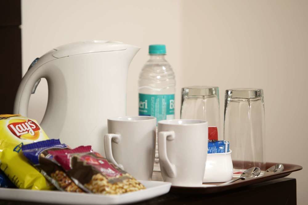 Нью-Дели: Stallen Suites Nehru Place by FabHotels