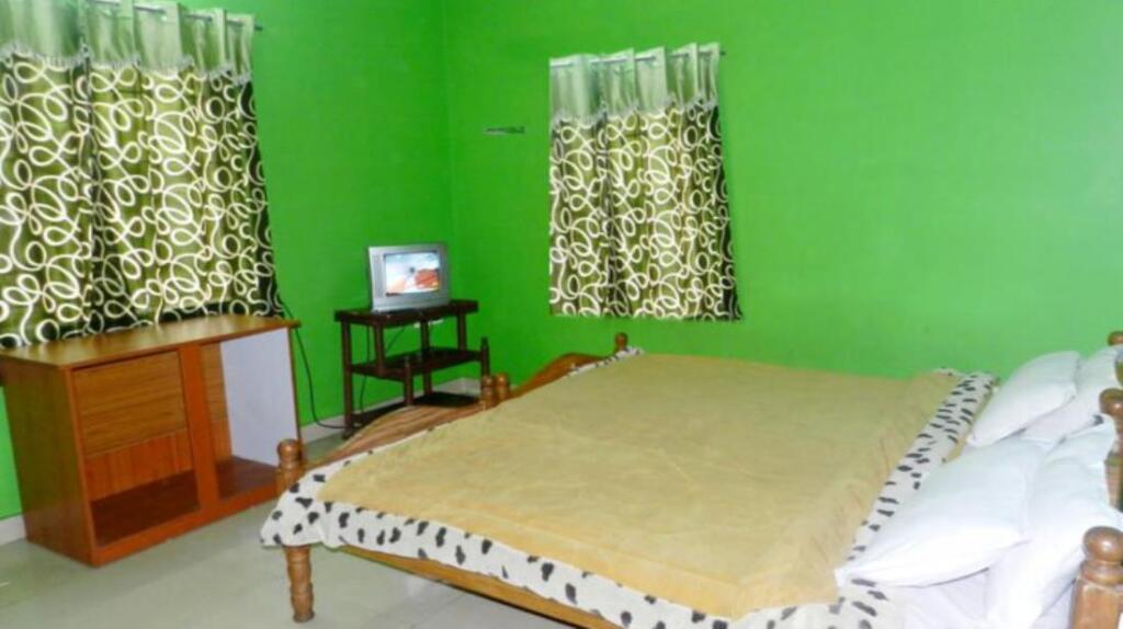Ути: Wave Inn Cottages