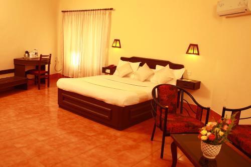 Кумили: Michaels Inn
