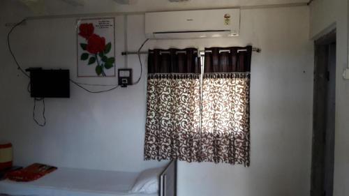 Сазан: Nitinbhai Home Stay
