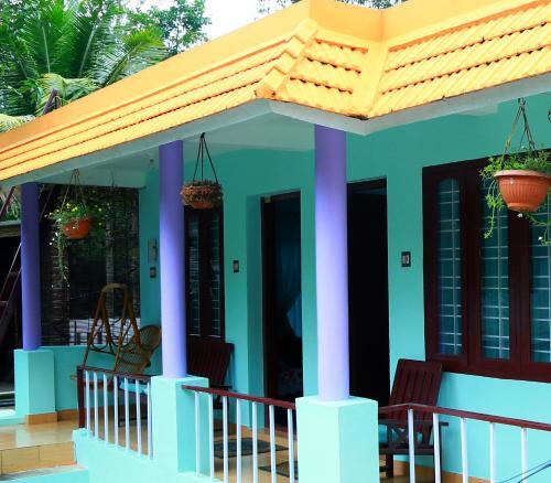 Кумили: House of Blue Mangoes