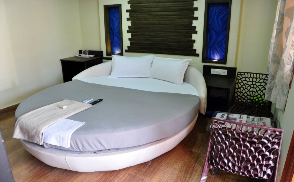 Нагоре: Hotel Anandhiram Heritage