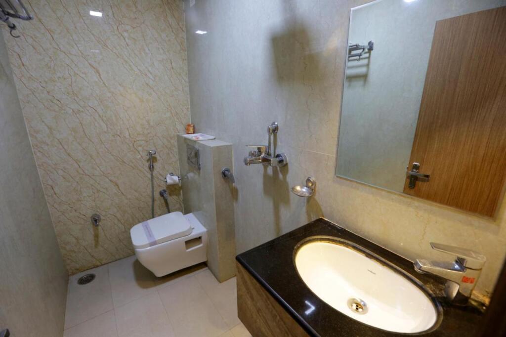 Праяградж: Hotel Pride Inn