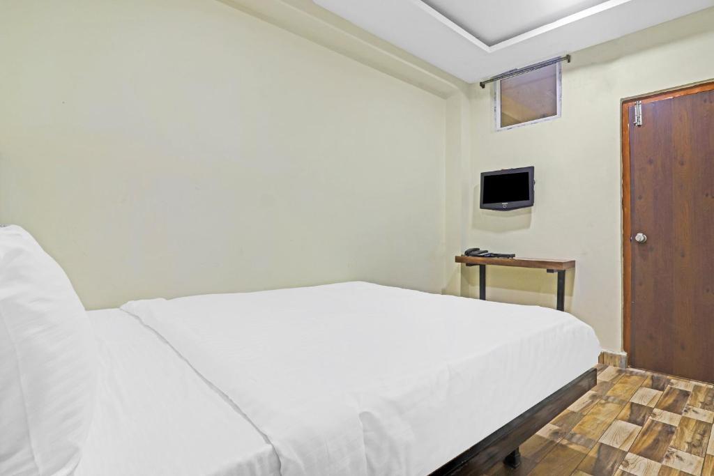Хидерабад: Capital O 85402 Sri Sai Regency