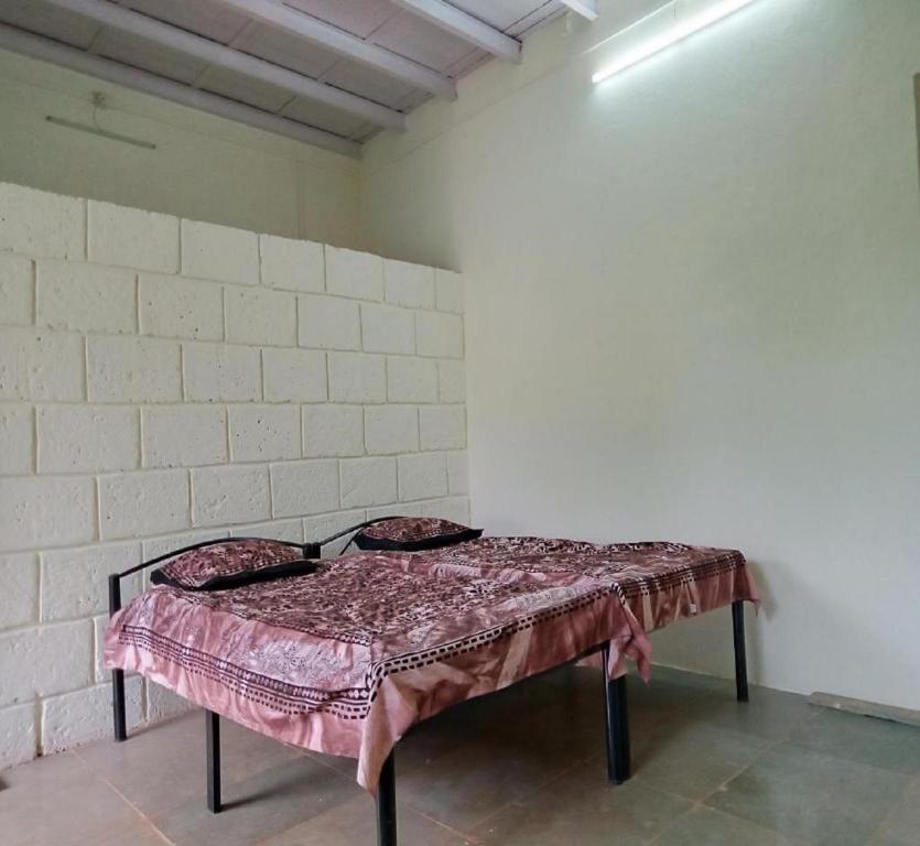 Пляж Ганпатипуле: Whistling Farms Home Stay