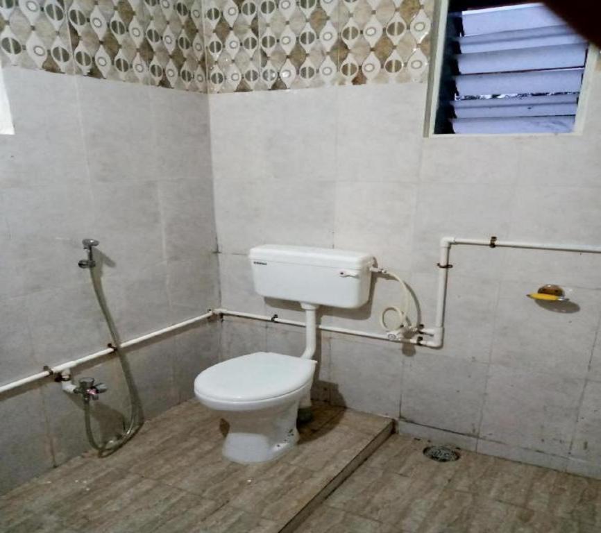 Пляж Ганпатипуле: Whistling Farms Home Stay