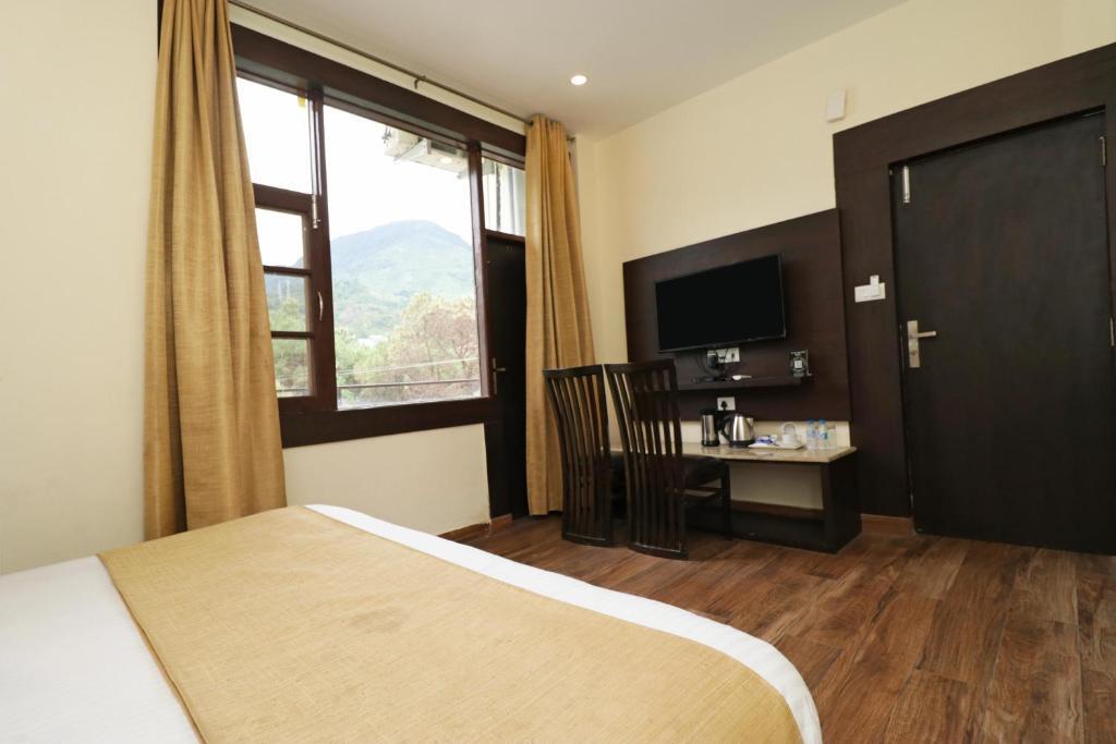 Дармсала: Hotel Mirage Residency - Hill View Hotel in Dharamshala