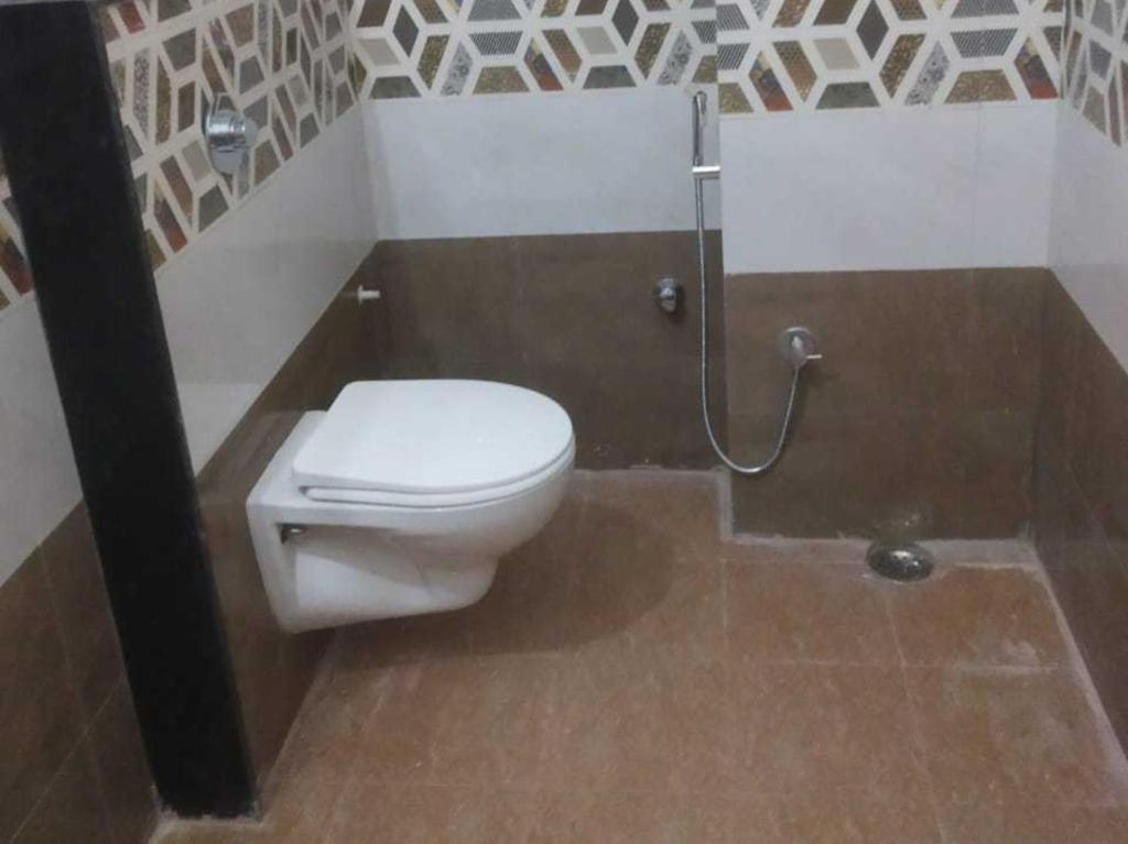 Патна: OYO 93387 Hotel Swarna Palace