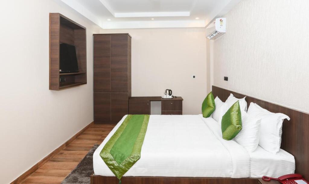 Полибетта: Treebo Trend Durga Boji Grand Gonikoppal Town