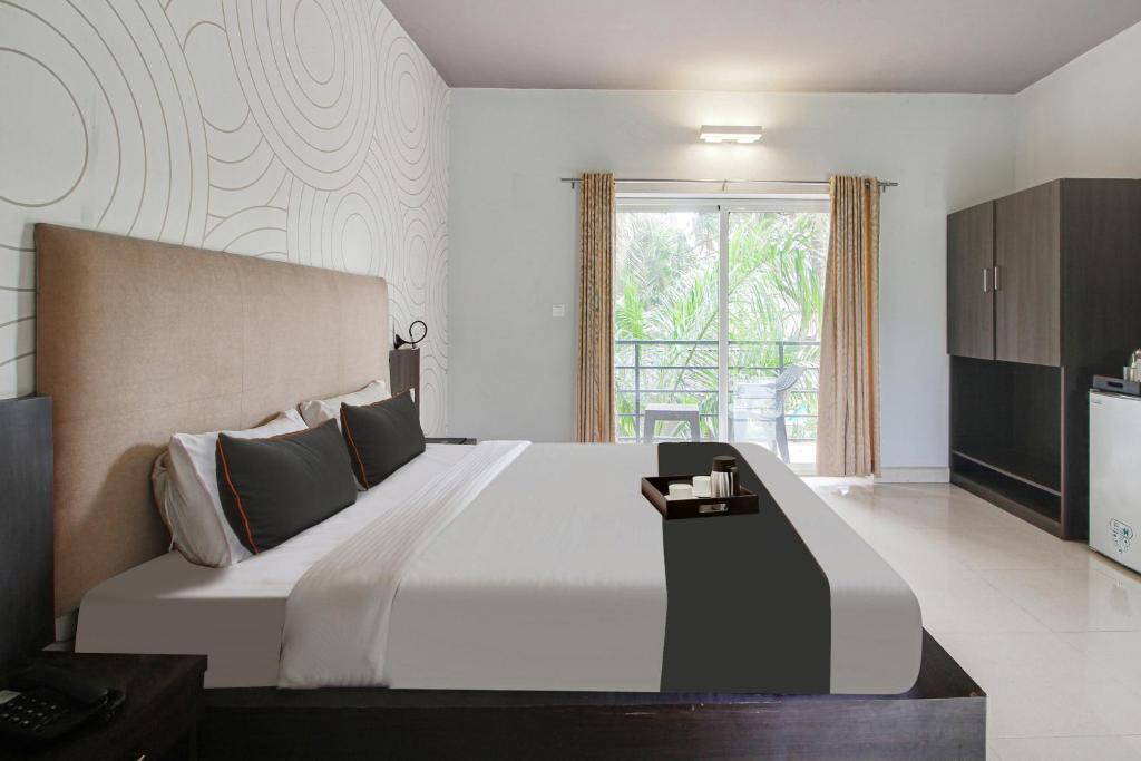 Морджим: Capital O 91277 Inn Resort
