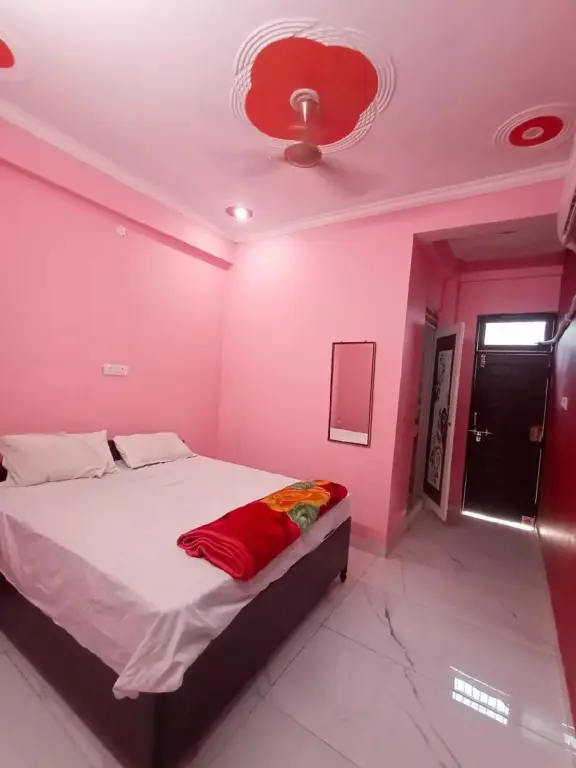 Джуси: OYO 88148 Ansuiya Guest House