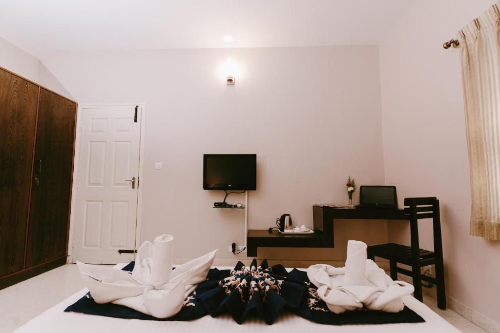 Бангалор: Athulya Square Rooms