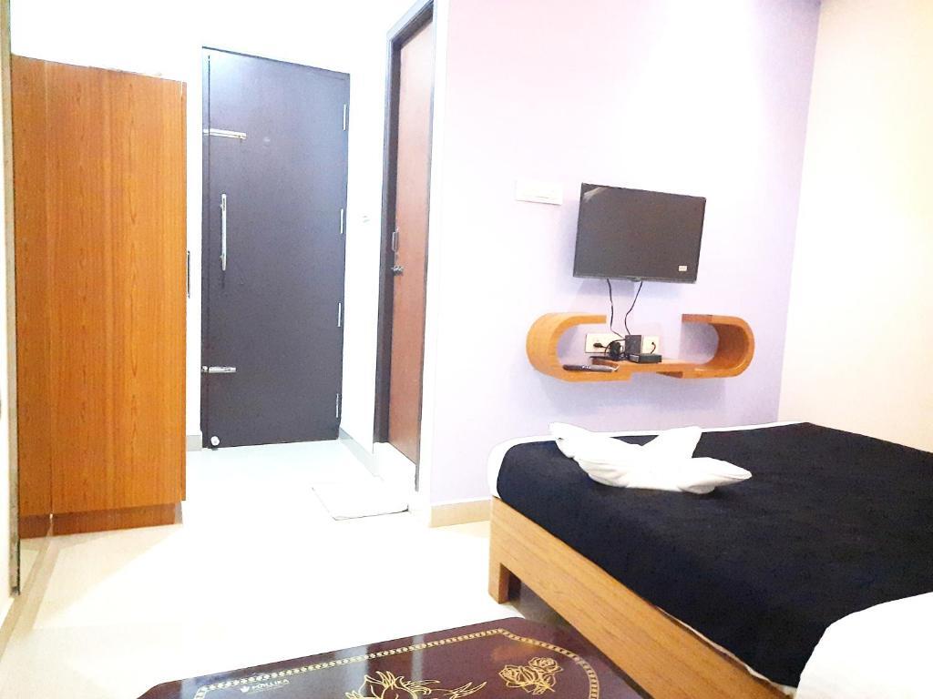 Солагампатти: Naadi stayinn New Busstand Thanjavur