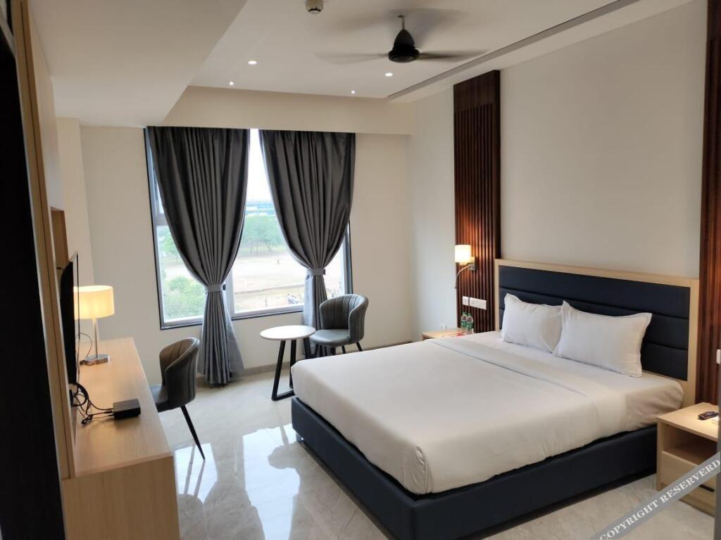 Пуна: Marigold Suites Wagholi