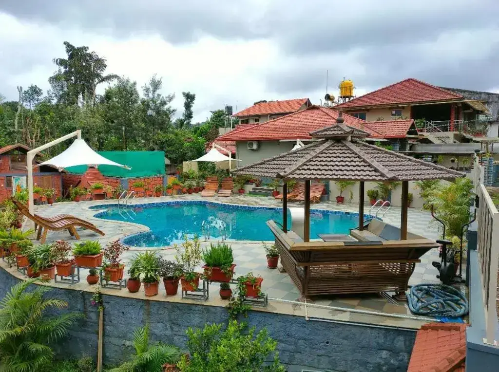 Кушалнагар: Srinikethana Home Stay with Swimming Pool