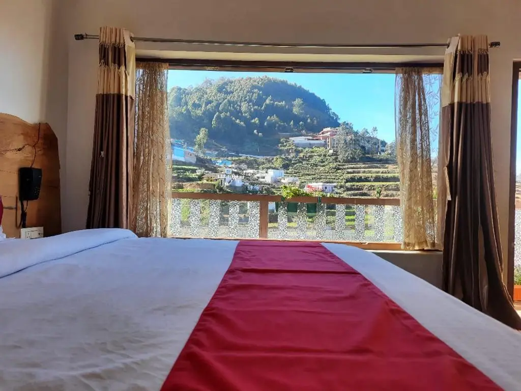 Ути: Sunset Valley Holiday Inn