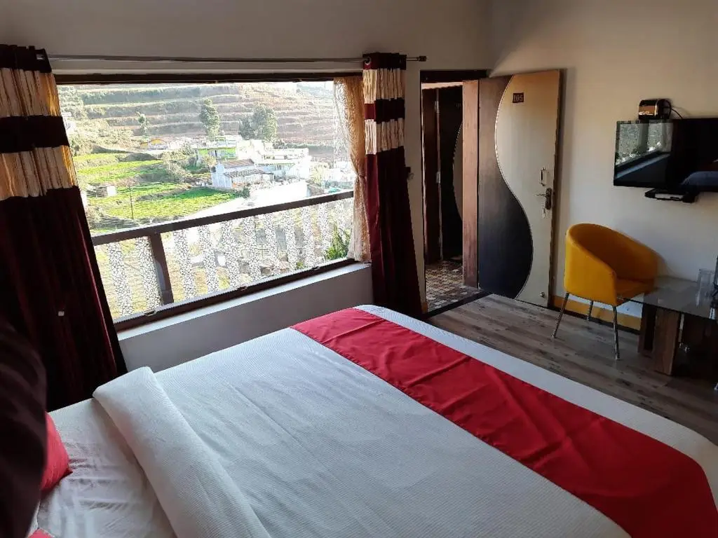 Ути: Sunset Valley Holiday Inn
