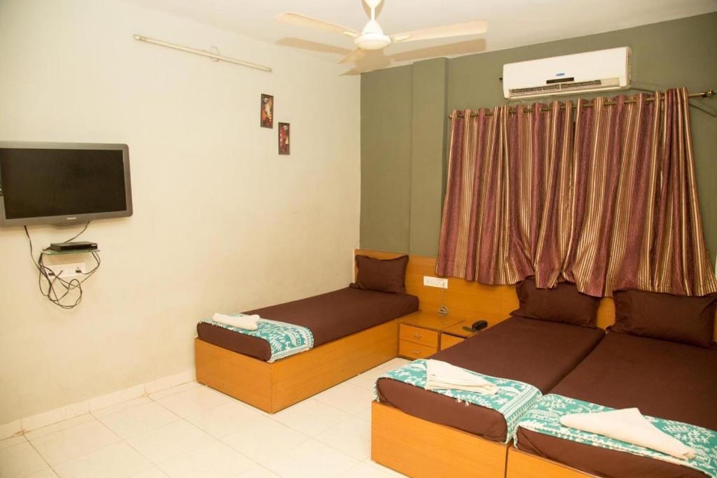 Мумбаи: Srujan Sarai Service Apartment
