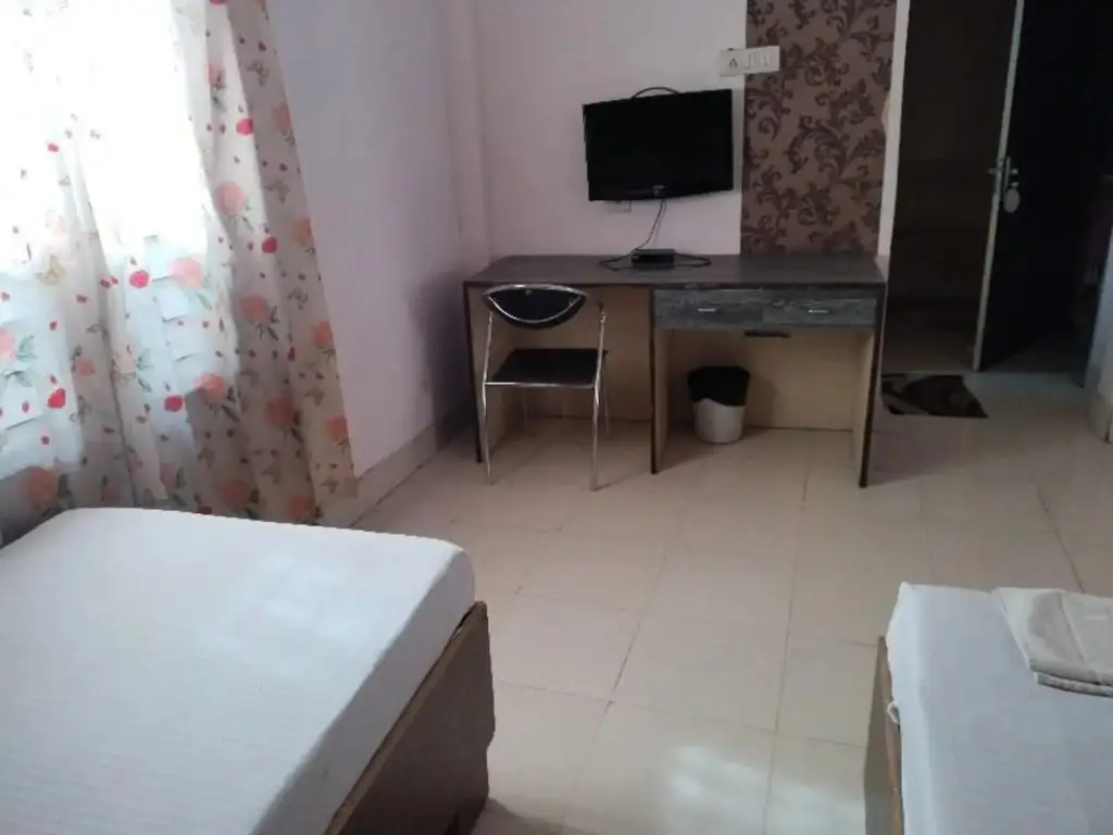 Дибругарх: Capital O 8801 Hotel JS Tower