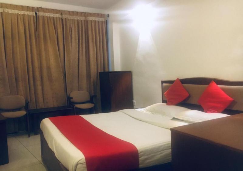Мадикери: Easternwoods Hotel Raj
