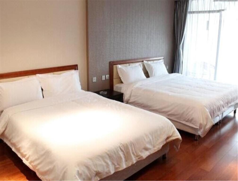 Далянь: Zhongshan Holiday Apartment