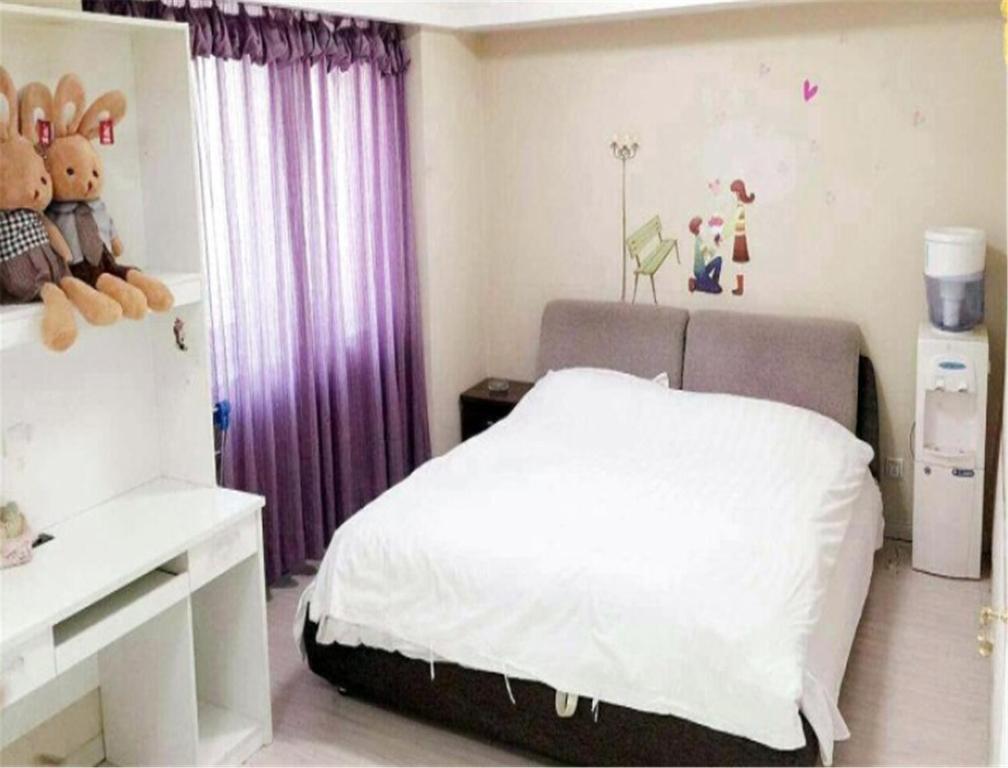 Далянь: Zhongshan Holiday Apartment