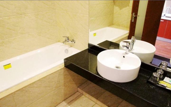 Циндао: Qingdao Shouchuang Airport Business Apartment