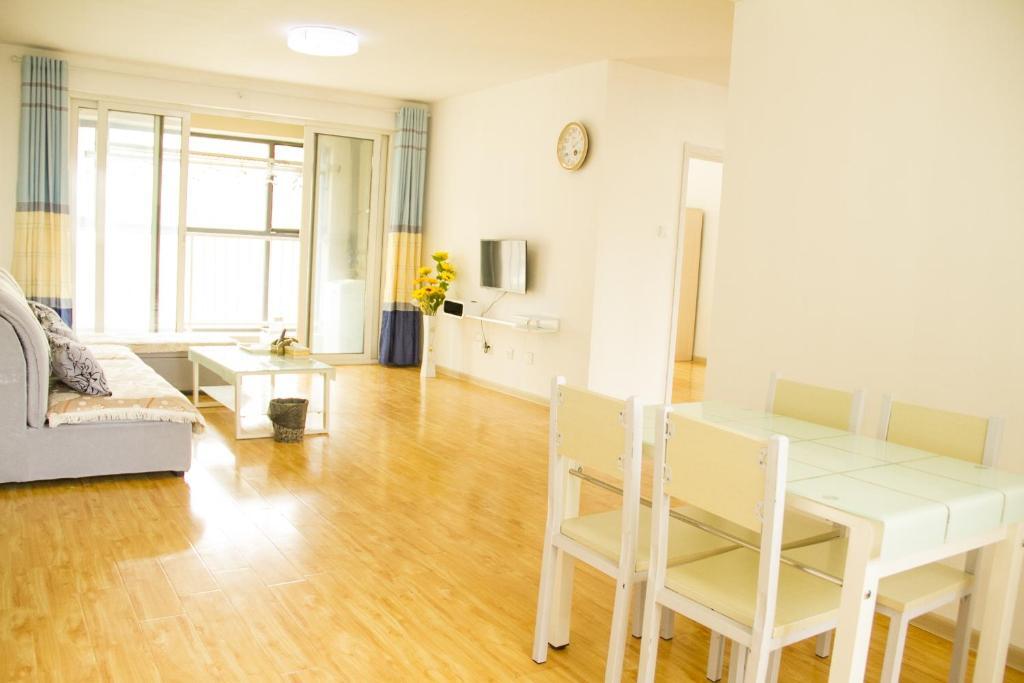 Циндао: Jinshatan Qingdao Huaxia Theseas Apartment