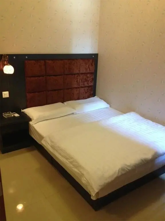 Сиань: Xi'an Qijia Apartment
