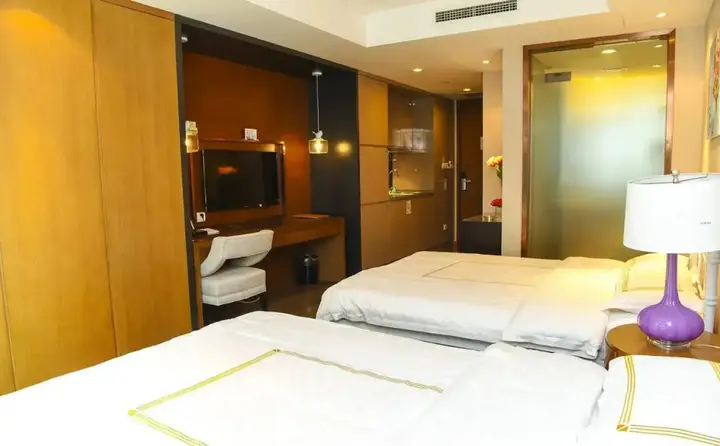Циндао: Qingdao Yujia Apartment