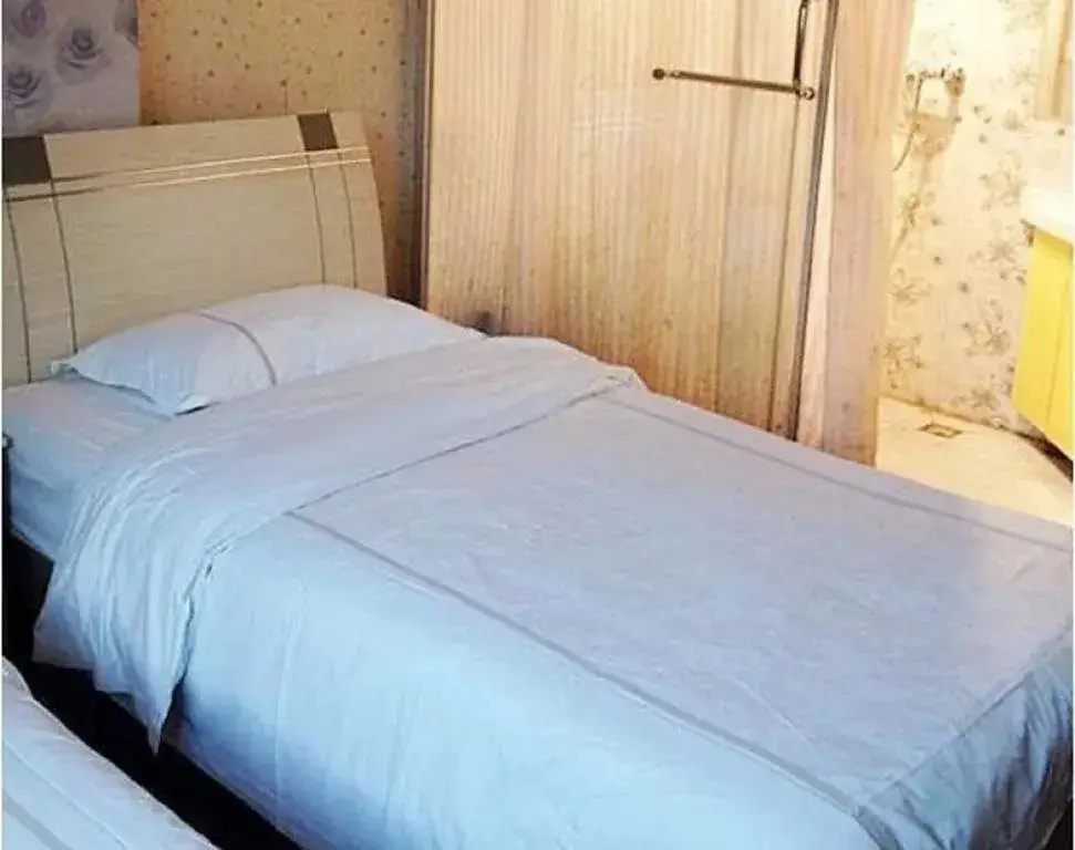 Мяньян: Beichuan Yijia Business Inn