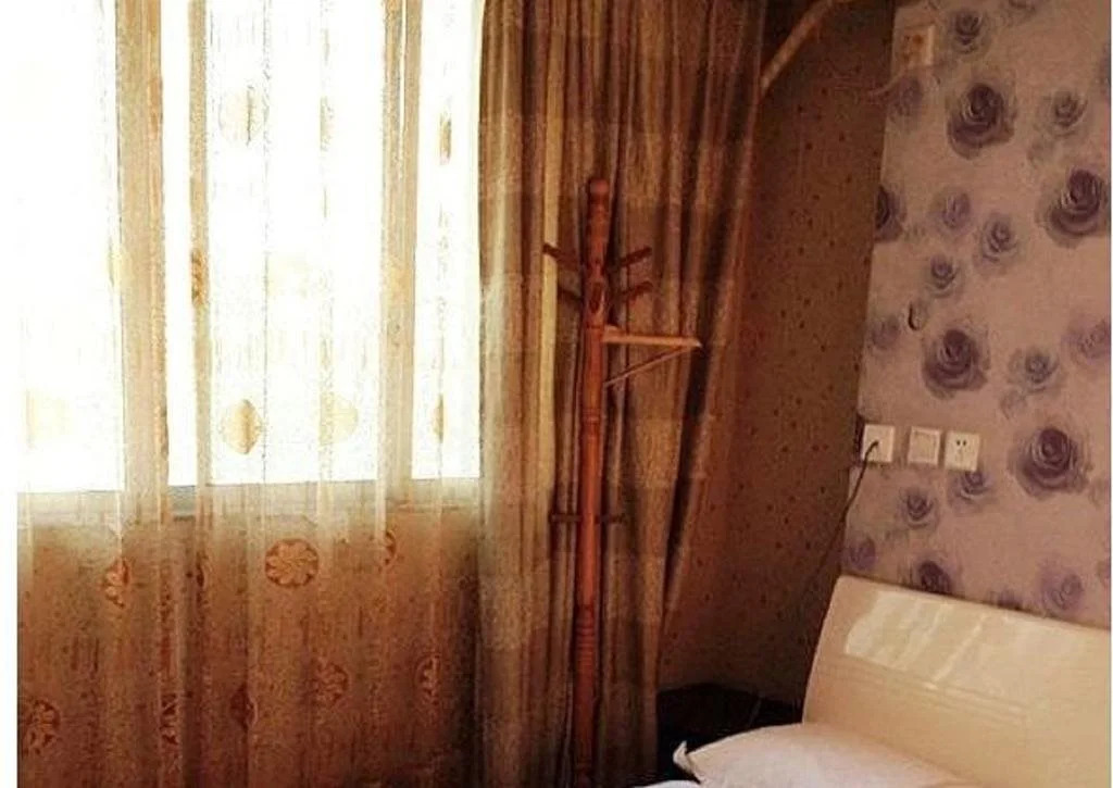 Мяньян: Beichuan Yijia Business Inn