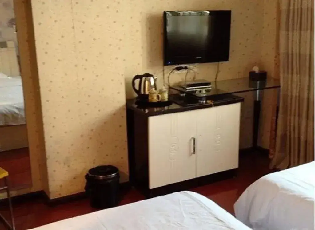 Мяньян: Beichuan Yijia Business Inn