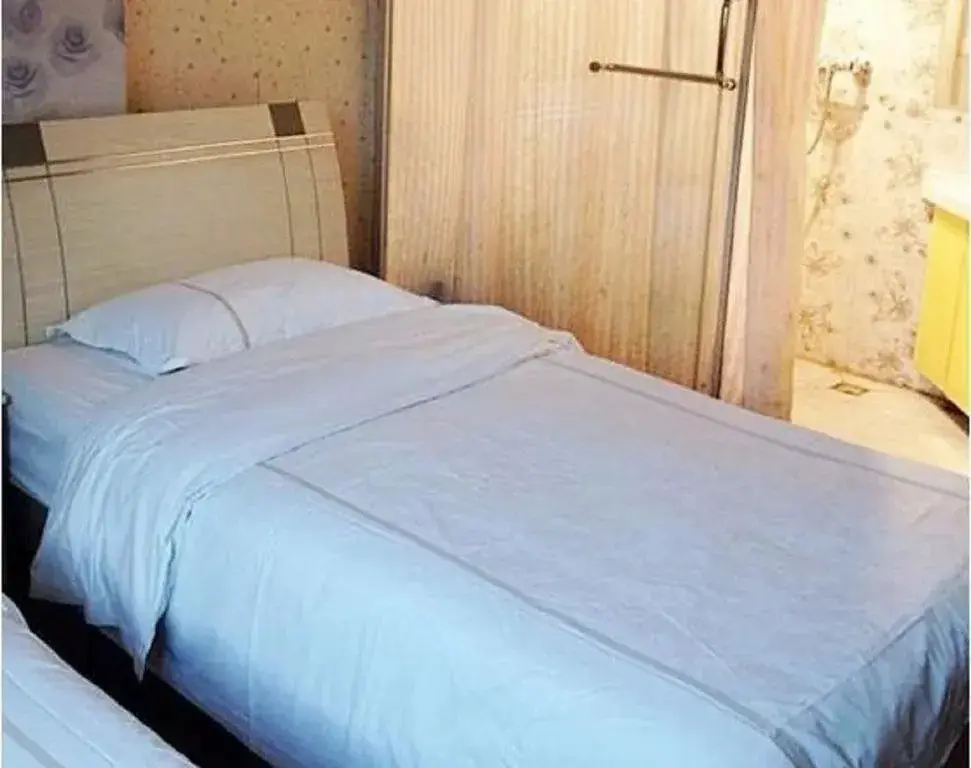 Мяньян: Beichuan Yijia Business Inn
