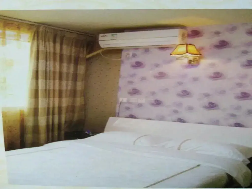 Мяньян: Beichuan Yijia Business Inn