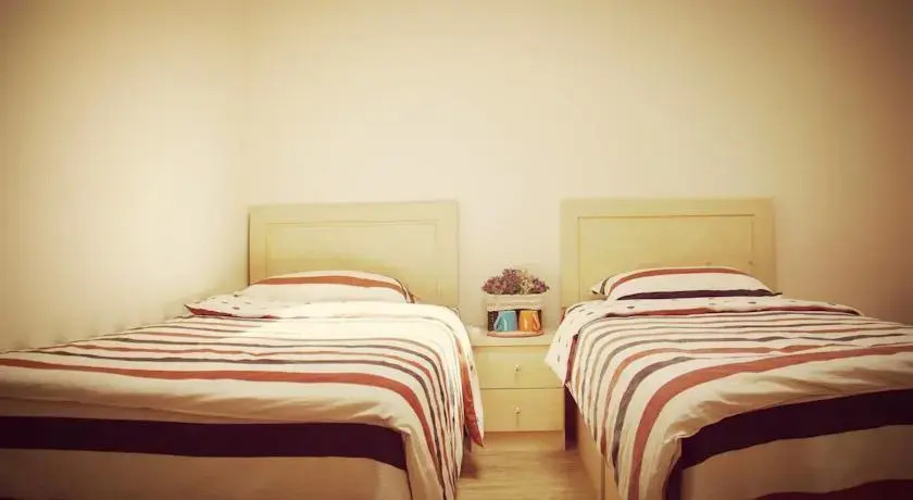 Циндао: Yuezhu Youth Hostel