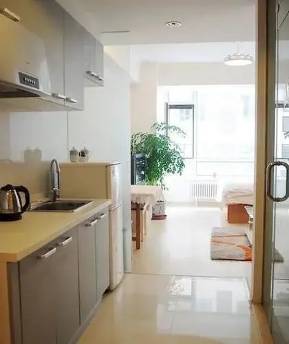 Далянь: Dalian Shangpinzhijia Apartment