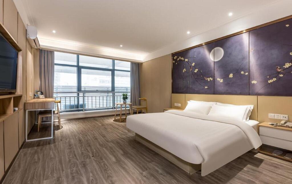 Шанхай: Elan Inn Taicang Wuyang Plaza