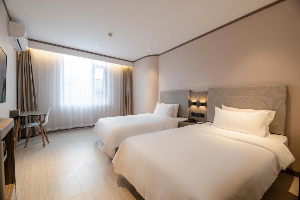 Ухань: Hanting Hotel Wuhan Qingshan Zhongyuan Plaza