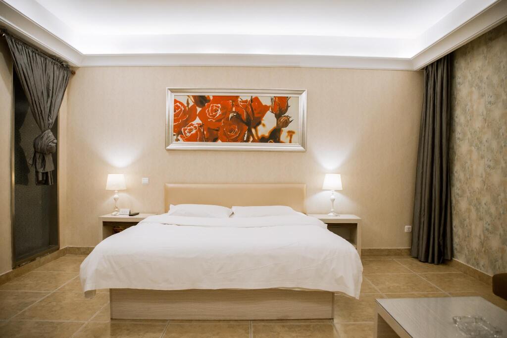 Яньтай: Elan Inn Yantai Zhenhua Commercial Building Joy City
