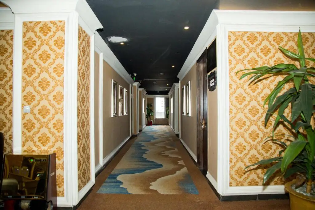 Яньтай: Elan Inn Yantai Zhenhua Commercial Building Joy City
