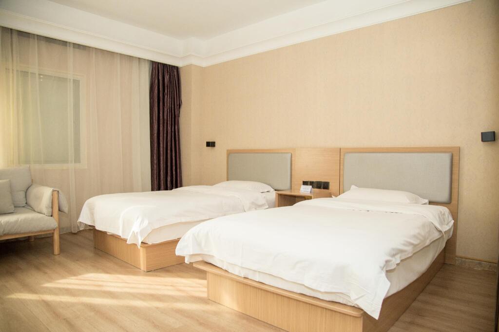 Яньтай: Elan Inn Yantai Zhenhua Commercial Building Joy City