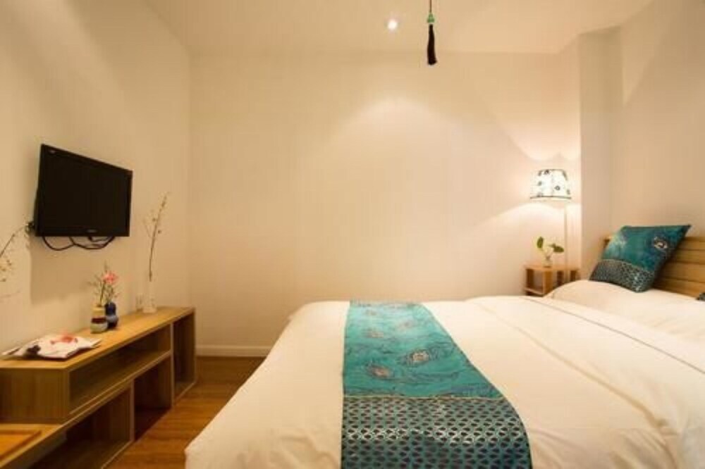 Пекин: Beijing Heshe Courtyard Hotel
