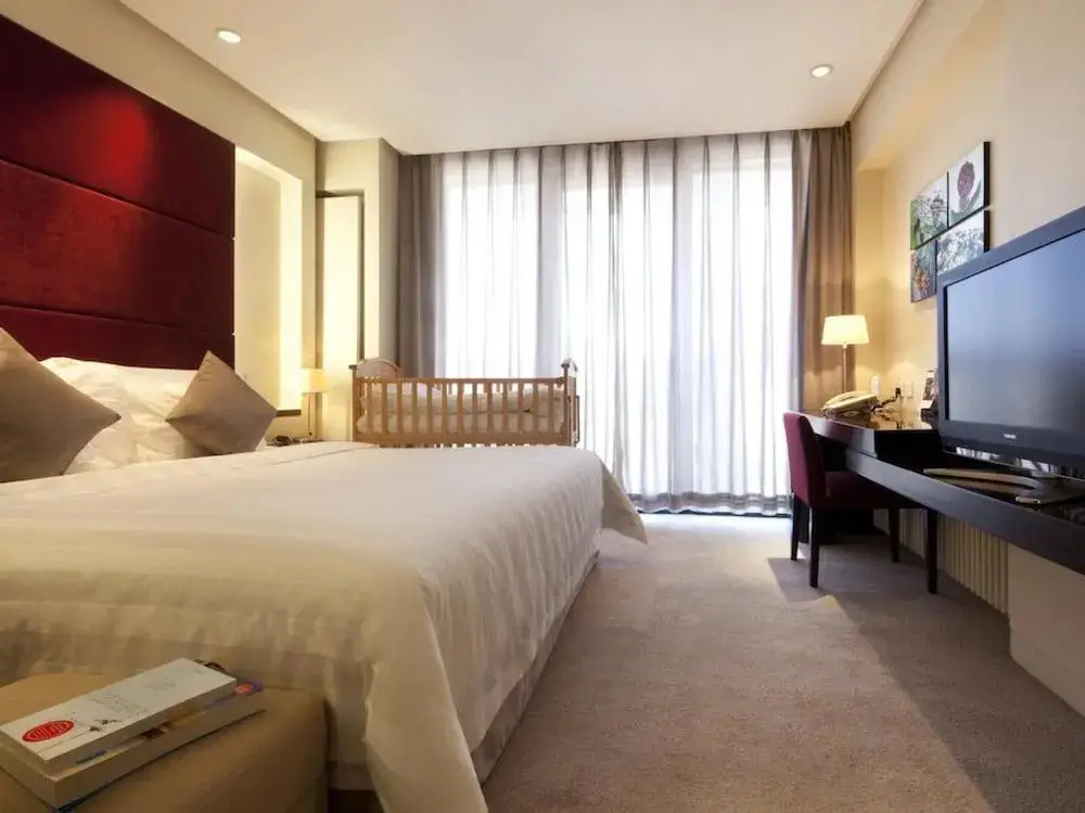 Далянь: Howard Johnson By Wyndham Parkland Hotel Dalian