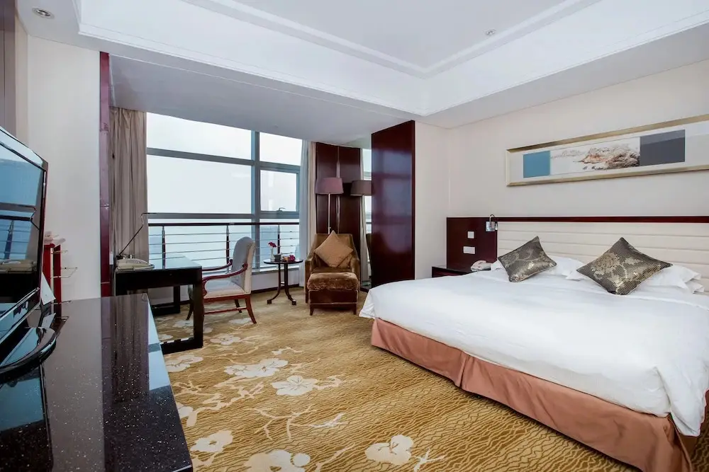 Циндао: New Century Hotel Qingdao