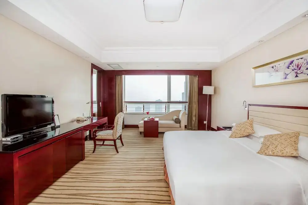 Циндао: New Century Hotel Qingdao