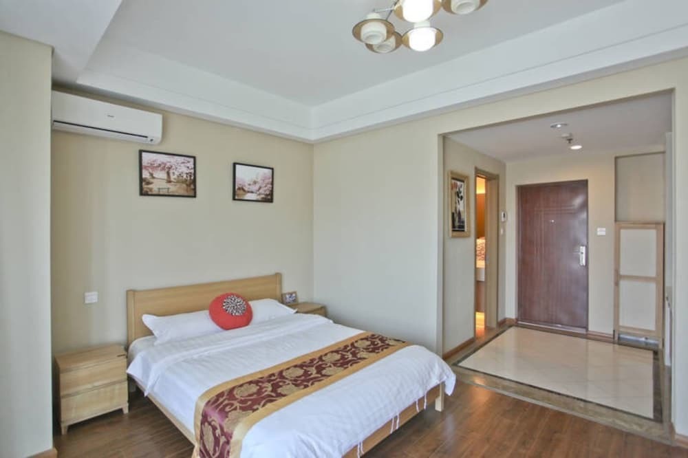 Далянь: Dalian Ming Jie Hotel Apartment - Wanda Plaza